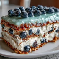 Lemon Blueberry Icebox Cake: No-bake slices with vibrant berries and creamy lemon filling.